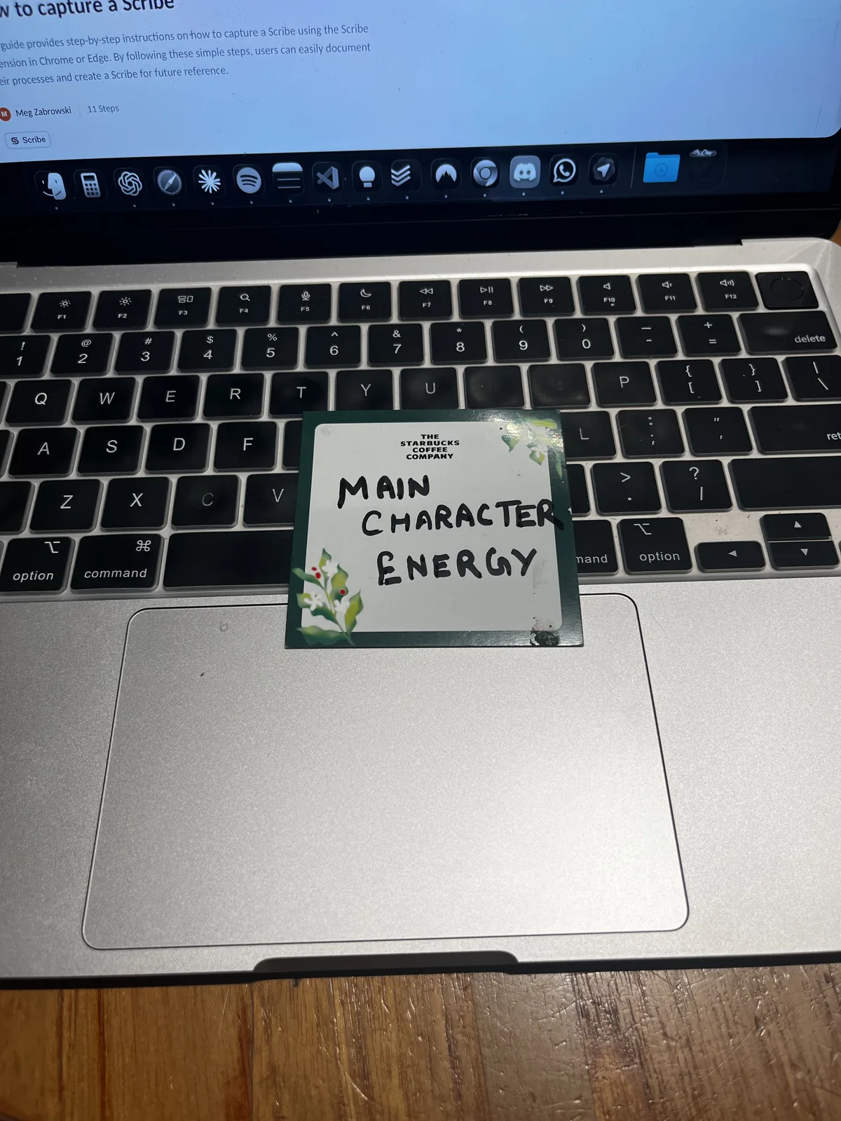 A Starbucks card reading Main Character Energy